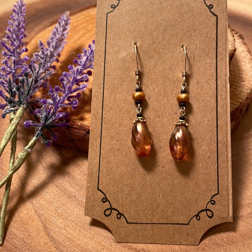 Women’s gold black dangle beaded earrings